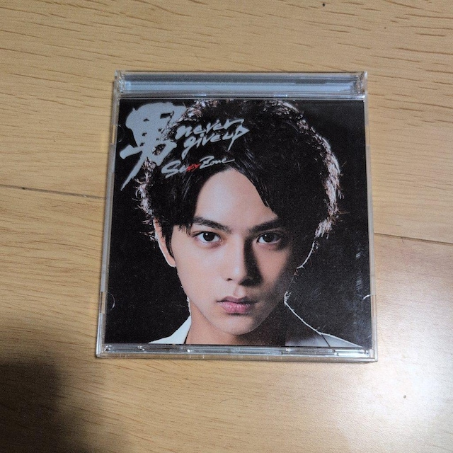 j never give up  CD/DVD/rfI 