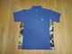 SOPHNET. \tlbg Jt TChpl |Vc S  CAMOUFLAGE SIDE PANEL POLO