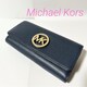 i Michael Kors }CPR[X ܂蒷z U[