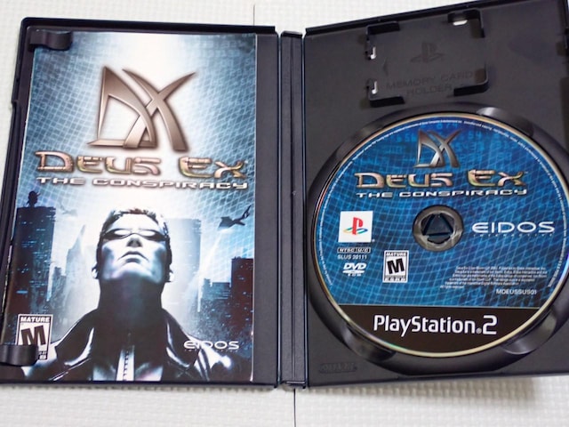 PS2DEUS EX THE CONSPIRACY CO kĔ  Q[{/\tg 