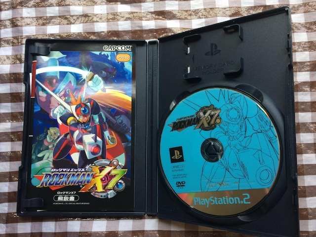 PS2 bN}X7@nKL@U{Zbg@KChubN@Mega Man  Q[{/\tg 