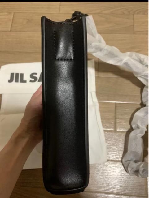 JIL SANDERV_[obO  uh 