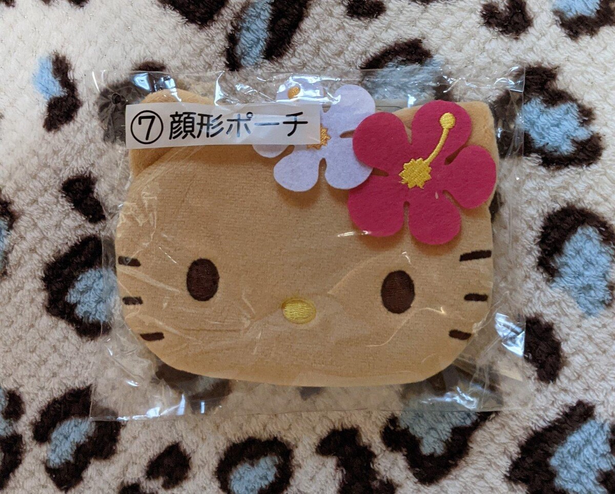 ハローキティ当りくじ(顔型ポーチ) 日焼けキティ サンリオ