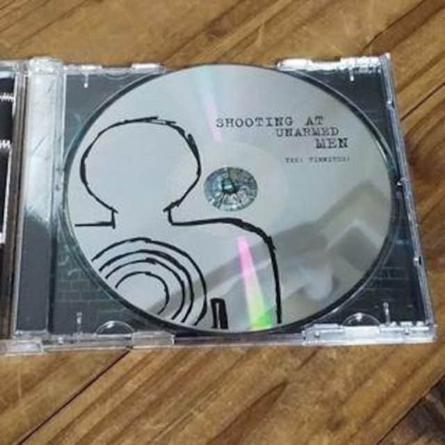 CD Yes! Tinnitus!/Shooting At Unarmed Men  CD/DVD/rfI 